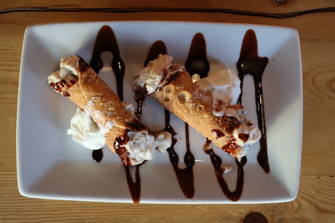 Cannoli with chocolate drizzle