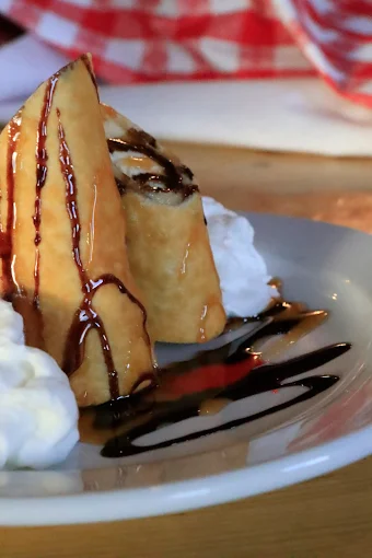 Fried dough with whipped cream