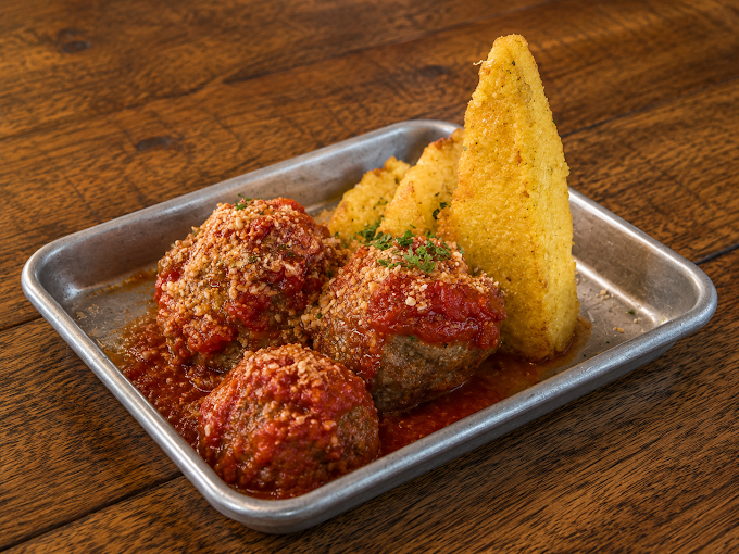Meatballs in marinara on a tray