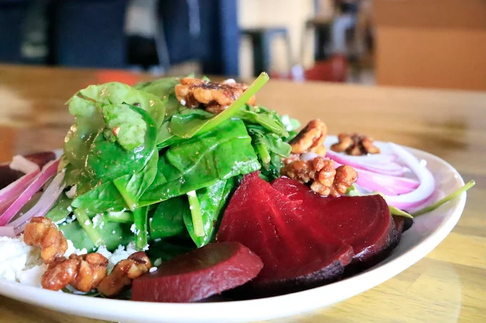 Spinach, beet, and walnut salad